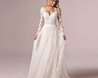 long sleeve floaty wedding dress