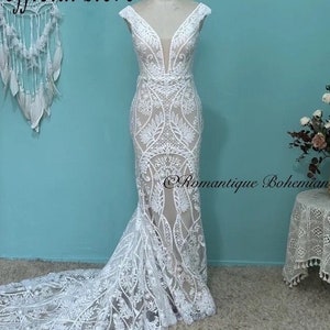 More Dresses @RomantiqueBoho.com Vintage Bohemia Mermaid Wedding Dress Chic Lace V Neck Short Sleeve Vestido De Noiva Luxury Bridal Gowns