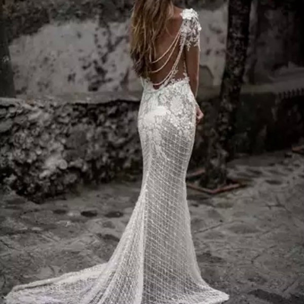 More Dresses @RomantiqueBoho.com Unique Bride Luxury Beading Exquisite Lace Boho Wedding Dress Long Sleeves Open Back Mermaid Bridal Gowns