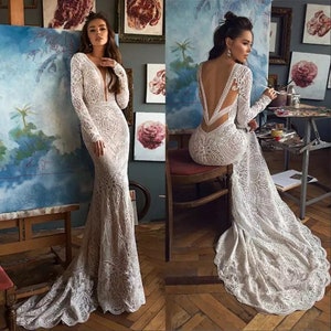 More Dresses @RomantiqueBoho.com Crochet Lace Mermaid Wedding Dress Vintage Long SleeveSexy Backless Chic Boho Bridal Gowns