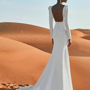 More dresses @RomantiqueBoho.com Square Neck Crepe Mermaid Wedding Dress Long Sleeves Stretch Matte Bridal Gowns