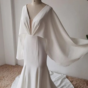 More Dresses @RomantiqueBoho.com Modern Crepe Mermaid Wedding Dress Unique Bat Sleeve Elegant V Neck Illusion Back Bridal Gowns