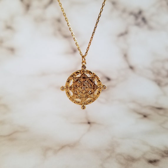 Compass on sale coin necklace