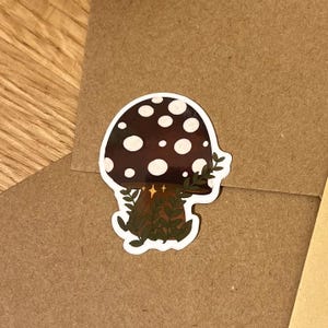 Handgetekende vinylsticker paddenstoel en varen