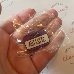 I am autistic pin badge