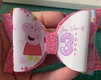 Peppa pig birthday bow.