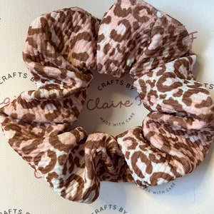 Blush leopard print scrunchie
