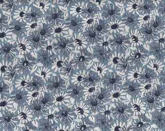 May include: A blue and white floral fabric with a repeating pattern of small daisies.