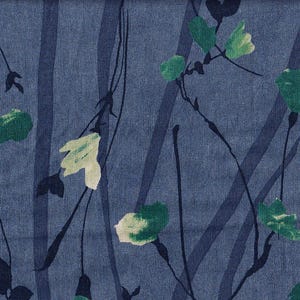 May include: Blue fabric with a white and green floral pattern. The pattern features stylized leaves and flowers.