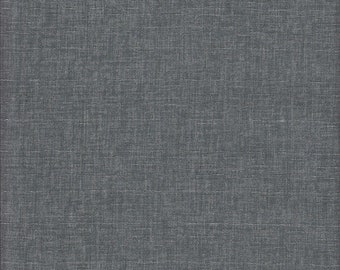 May include: A close-up of a dark gray textured fabric with a subtle woven pattern.