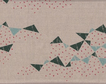 May include: A beige fabric with a geometric pattern of dark green and light blue triangles. The fabric is covered in a scattered pattern of small red triangles.