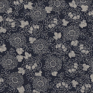 May include: Dark navy fabric with a repeating pattern of stylized, light beige floral designs. The flowers are detailed with white outlines, creating a textured appearance. The overall design is reminiscent of traditional Japanese textiles.