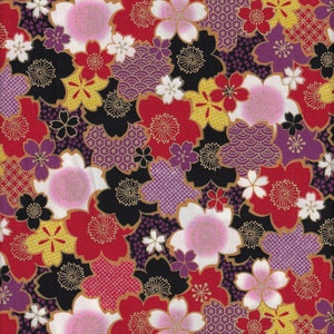 May include: A black fabric with a repeating pattern of pink, red, and yellow flowers. The flowers are outlined in gold and have a textured appearance. The background is black with a subtle pattern of gold dots.