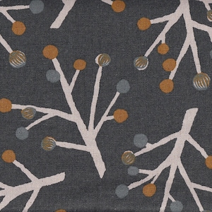 May include: A dark gray fabric with a white and orange floral pattern. The pattern features stylized branches with small round orange and gray berries.