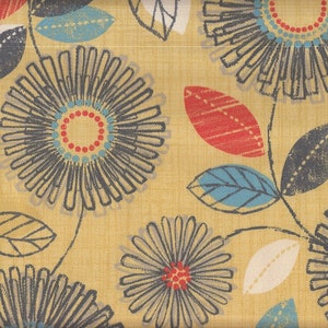 May include: A beige fabric with a repeating pattern of stylised flowers and leaves. The flowers are black, grey, and blue with red and white accents. The leaves are red, blue, and grey.