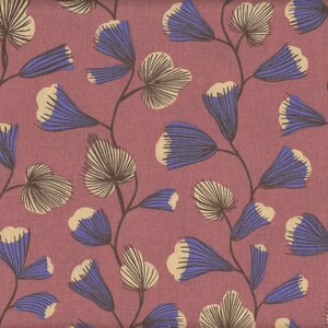 May include: A floral pattern featuring stylized blue and cream-colored flowers and leaves on a mauve background. The design includes dark brown stems and veins, creating a repeating botanical motif. The fabric has a textured appearance.