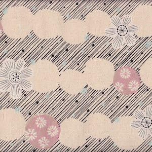 May include: A fabric pattern featuring a repeating design of white circles, black diagonal lines, and stylized flowers. Pink circles with white floral patterns are interspersed throughout the design. Small black and light blue dots add detail.