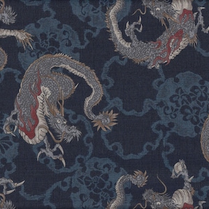 May include: A dark blue fabric with a repeating pattern of stylised dragons. The dragons are grey and have red accents. The fabric has a textured, woven look.