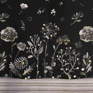 May include: A black floral pattern with grey and yellow stylized flowers and foliage. The design includes a border of horizontal stripes at the bottom. The overall aesthetic is elegant and botanical.