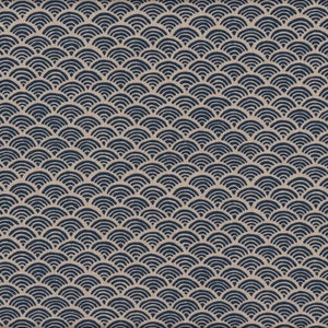 May include: A close-up of a fabric with a repeating pattern of navy blue, semi-circular shapes on a beige background. The design resembles stylized waves or scales, creating a textured, all-over pattern. The fabric is likely used for upholstery or home decor.