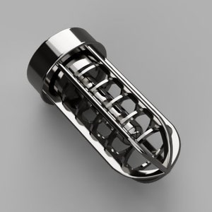 Peut inclure: Un bouchon de bouteille en métal argenté en forme de cage cylindrique.