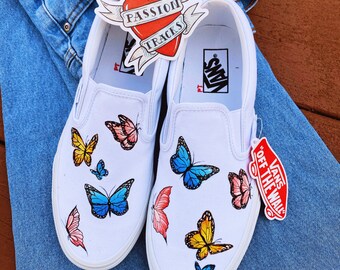 white vans with butterflies