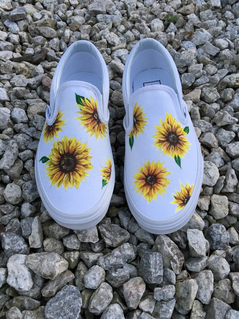 white slip on vans with sunflowers