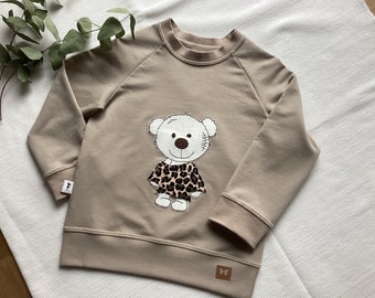 Sweatshirt mit Stickmotiv und Raglanärmeln, Pullover bestickt