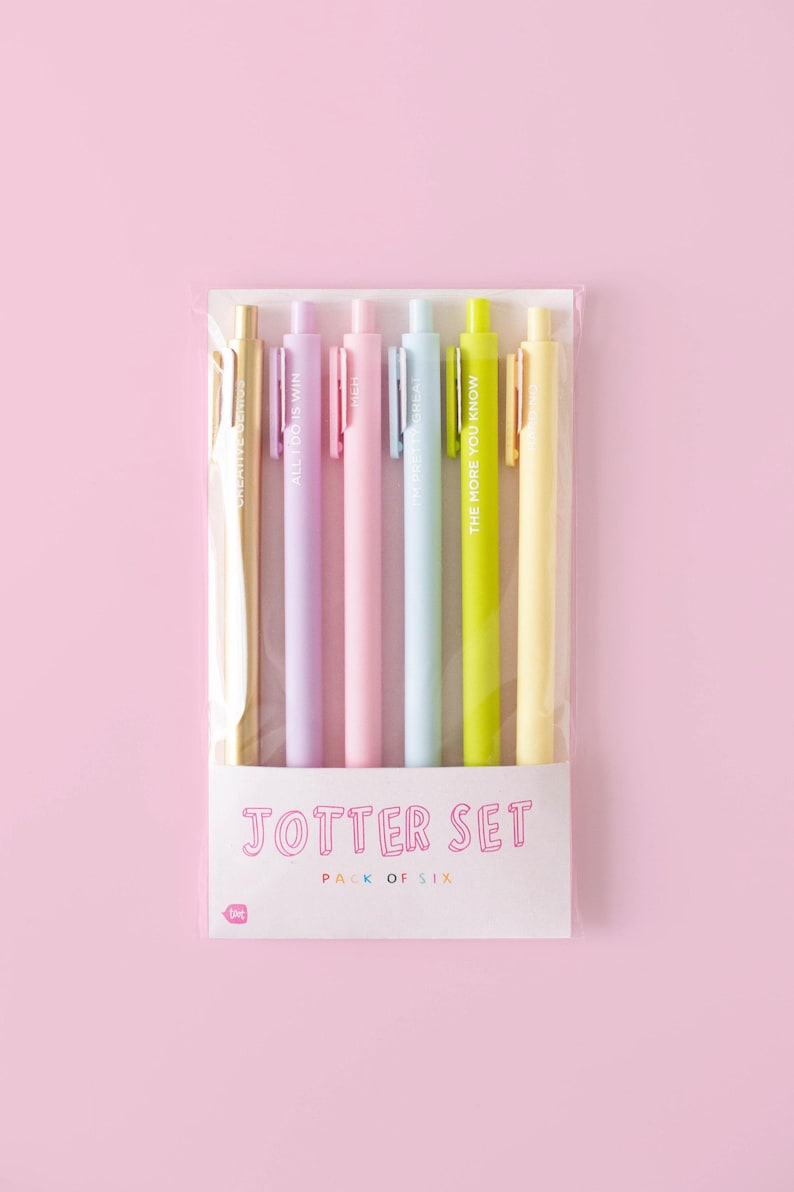 May include: A set of six pastel-colored pens with motivational quotes. The pens are packaged in a clear plastic bag with a white label that reads "Jotter Set Pack of Six".
