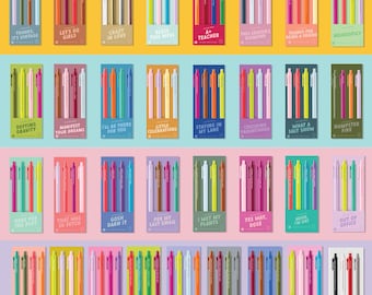 May include: A collection of rectangular cards, each displaying four retractable pens in various colors. Each card features a unique phrase printed at the bottom, such as 'Thanks, It's Vintage', 'Neurospicy', 'Dumpster Fire', 'Per My Last Email', 'Cozy Reader', and 'That's All'.