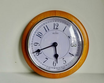 Horloge Acctim anglaise murale ovale en bois à quartz design marin 1990