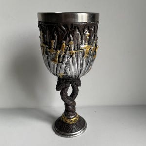 Medieval swords dragon fantasy game  drinking goblet cup  chalice