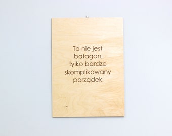 Wood burned sign “To nie jest bałagan”