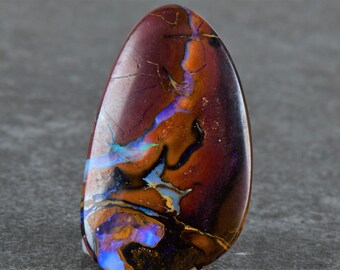 Boulder Opal Predrilled. 32mm x 17mm. 39.45cts