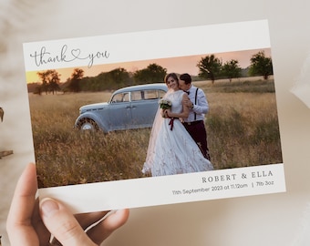 May include: Thank you card with a photo of a couple in a field with a vintage car. The text on the card reads "Thank you" and "Robert & Ella 11th September 2023 at 11:12am | 7lb 3oz".