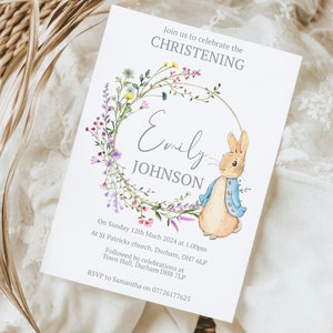 May include: A white card with a floral wreath and a bunny rabbit illustration. The text reads "Join us to celebrate the CHRISTENING Emily JOHNSON On Sunday 12th March 2024 at 1.00pm At St Patricks church, Durham, DH7 6LP Followed by celebrations at Town Hall, Durham DH8 7LP RSVP to Samantha on 07726177625"