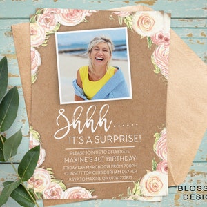 May include: A kraft paper birthday invitation with a floral border and a photo of a woman smiling. The text reads "Shhh... It's a surprise!" and includes details for a 40th birthday party.