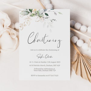 May include: A white card with green and gold floral illustrations. The text on the card reads "Christening", "Join us to celebrate the christening of Sophia Clarke", "At 11.15am on Sunday 11th August 2023", "At St Patricks church, Durham, DH7 6LP", "Followed by celebrations at Town Hall, Durham DH8 7LP", and "RSVP to Samantha on 07726177625".