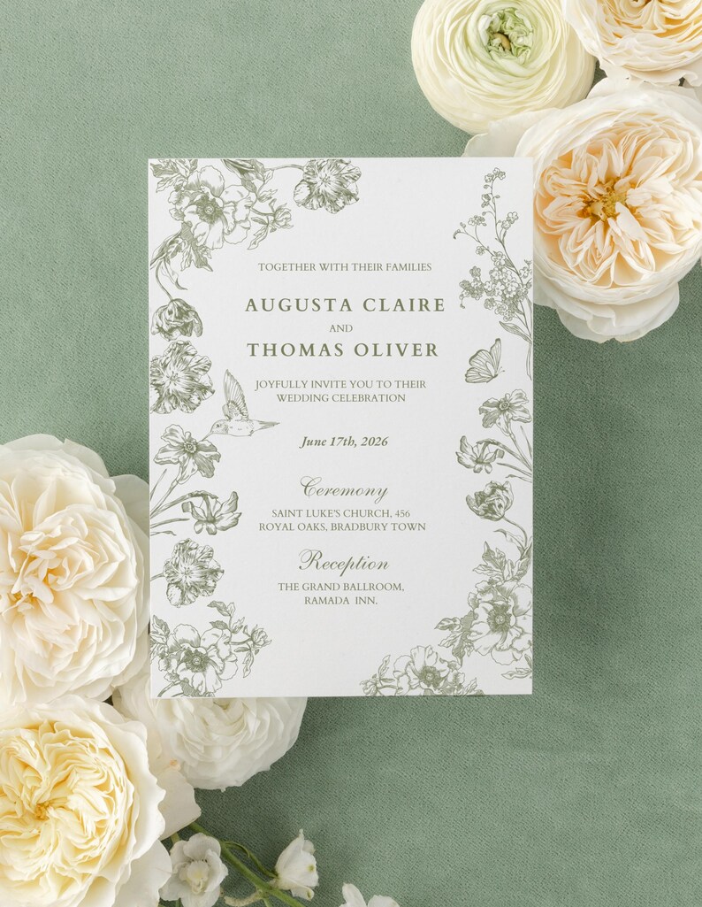 May include: A wedding invitation with floral illustrations in a soft green hue. The invitation features the names Augusta Claire and Thomas Oliver, along with the wedding date and location. White flowers surround the invitation on a light green background.