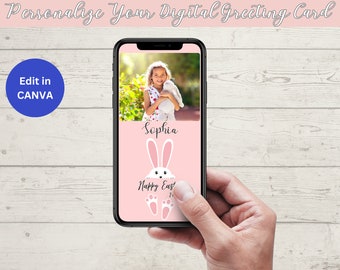 May include: A pink digital greeting card with a photo of a girl in a white dress holding a stuffed bunny. The card says "Sophia" and "Happy Easter" with a bunny peeking out from behind the text and bunny footprints below.