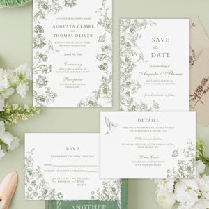 May include: A set of wedding stationery with floral and butterfly illustrations. The invitation includes details for Augusta Claire and Thomas Oliver's wedding on June 17th, 2026. RSVP and details cards are also included. The stationery is light green.