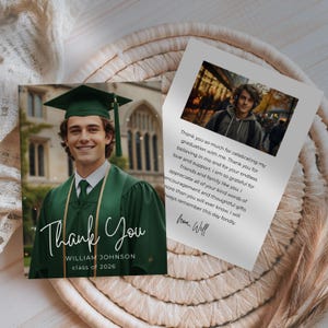 May include: A graduation thank you card featuring a young man in a green cap and gown. The card says "Thank You" in elegant script, with the graduate's name and class year. A second card with a photo and a thank you message is also visible.