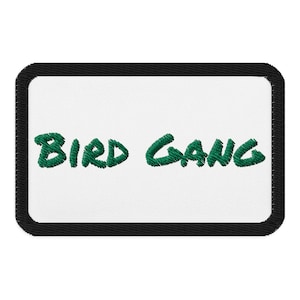 May include: Green embroidered patch with the words "BIRD GANG" on a white background with a black border.