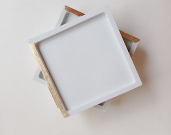 White square pocket trays, pointed with gold
