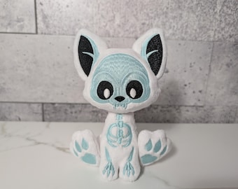 Peluche di gatto scheletrico che si illumina al buio