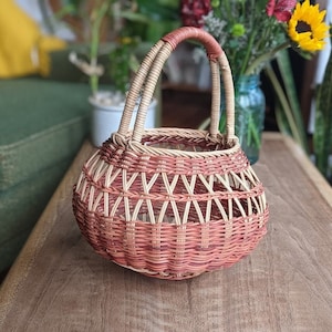 pink round handled wicker flower gathering basket | rustic country bohemian garden farmhouse wedding