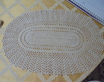 Hand crocheted oval doily 15"x9.5" in Beige #10 thread