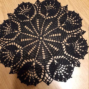 New hand crocheted 12 &quot;doily in tulip pattern, washable thread in Black