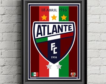 May include: A framed poster featuring the Atlante FC crest with the text 18 ABRIL 1916, three yellow stars, and two silver stars. The background consists of vertical red, white, and green stripes, with a small Mexican flag and a league logo at the bottom.