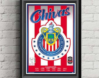 May include: Framed poster featuring the Chivas Guadalajara soccer team logo. The design includes the team's name in blue, a crest with a knight's helmet, and red and white stripes. The poster lists championship years.